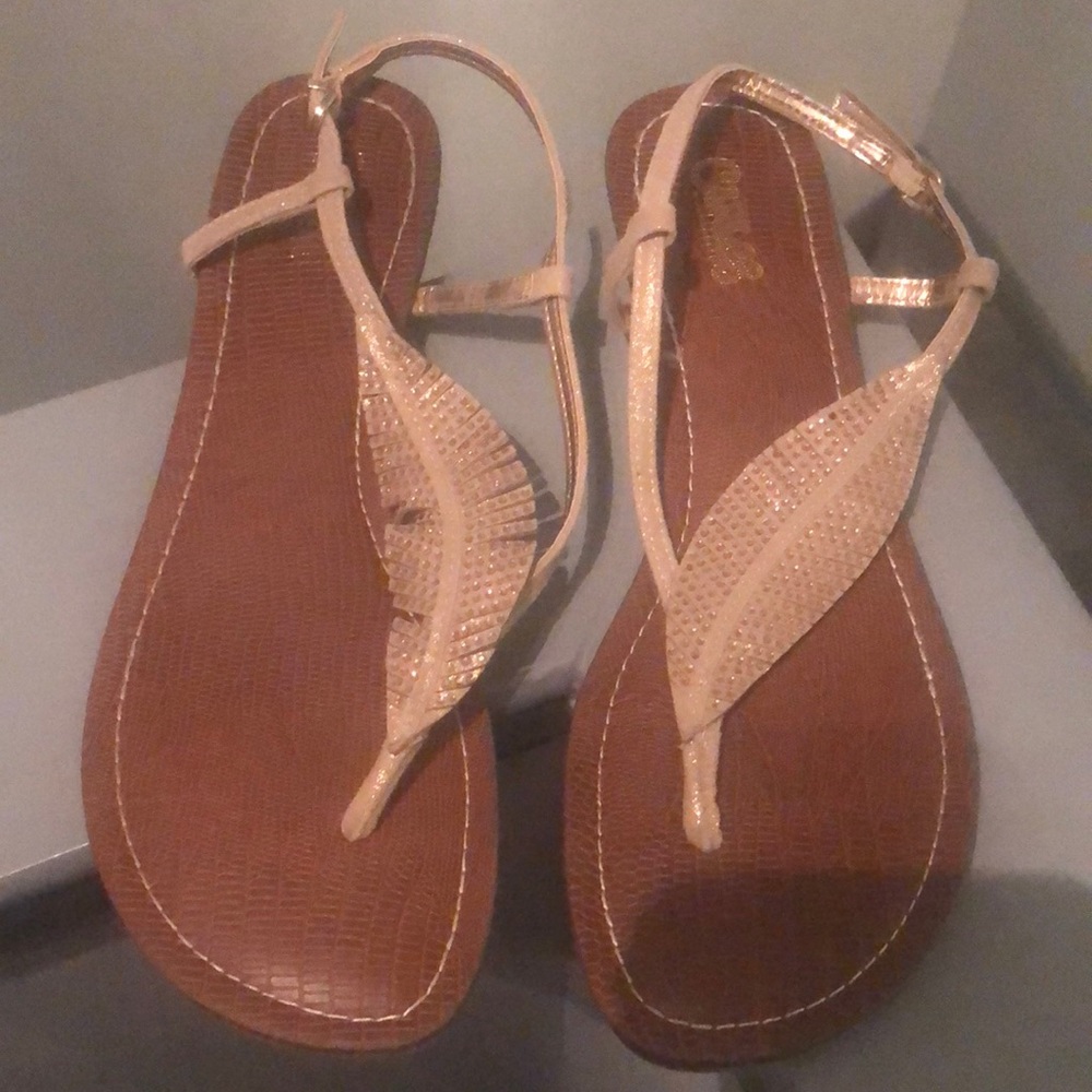 Gently worn Carlos Santana Gold feather sandals